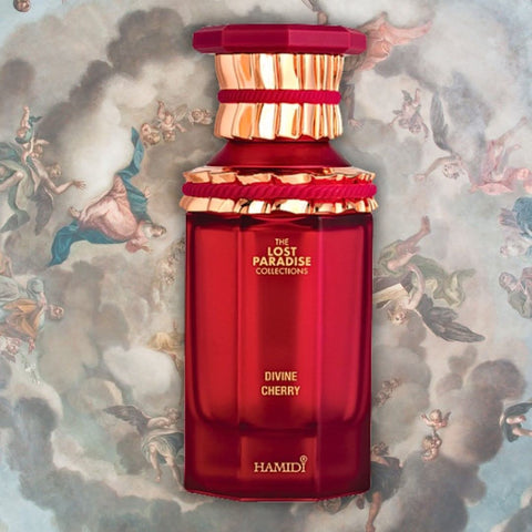 Hamidi Divine Cherry & Celestial Wood Eau de Parfum spray bundle with three 100ml bottles, elegant packaging and fragrance bottles.