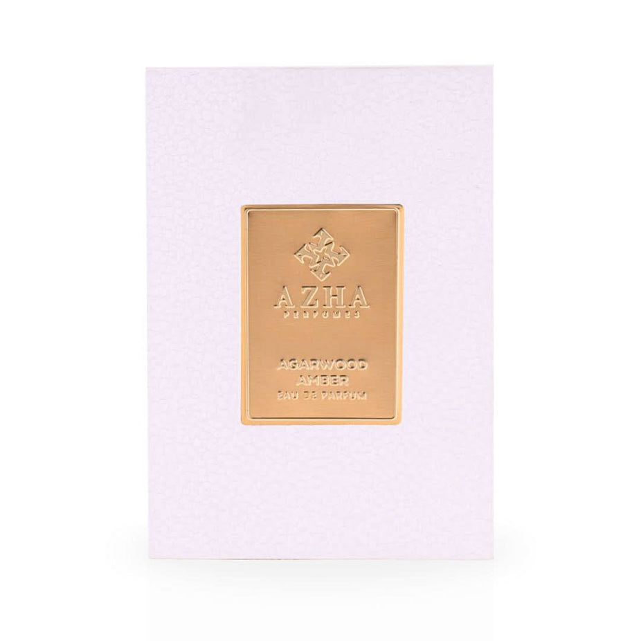 Aromatherapy-themed bottle of Azha Agarwood Amber Eau de Parfum Spray 100ml with elegant packaging and gold accents.