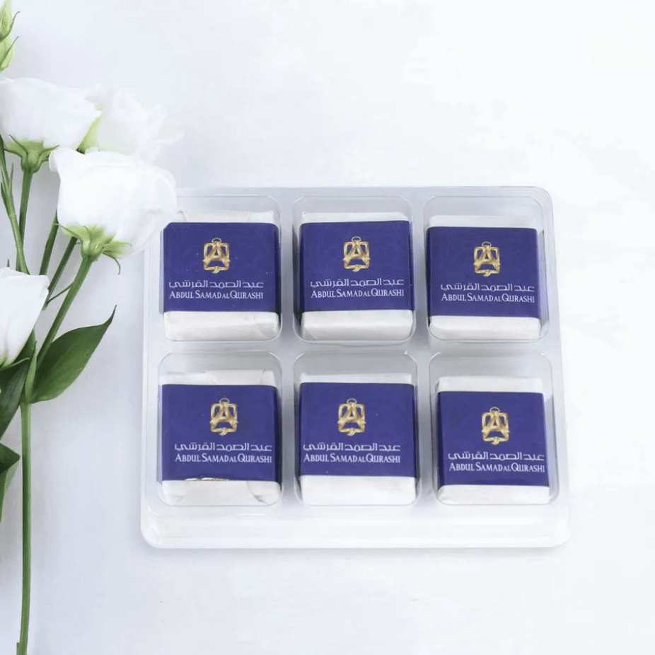 Six solid musk cubes by ASQ Abdul Samad Al Qurashi, showcasing the traditional aromatic musk scent in a compact form.
