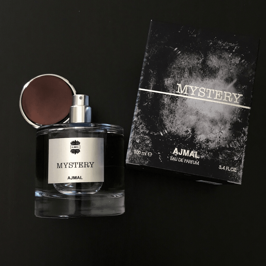 Ajmal Mystery for Men Eau De Parfum 100ml bottle, sleek packaging with a modern design, showcasing the men's fragrance.