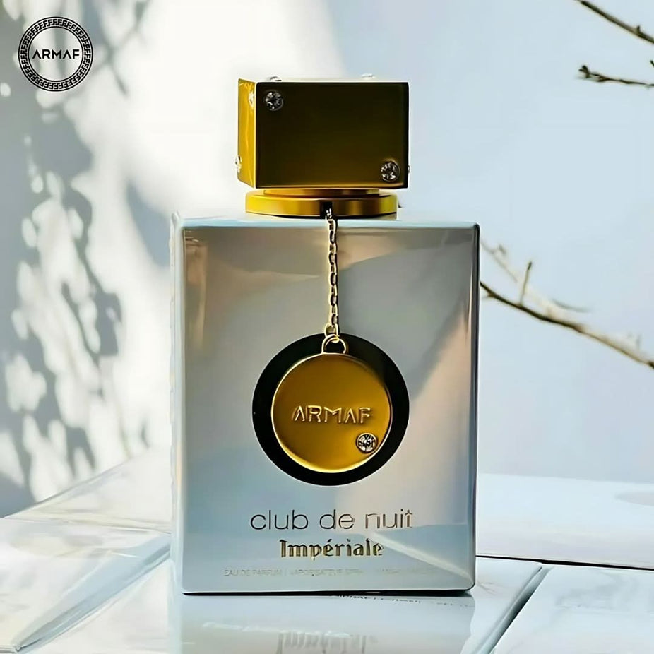 Armaf Club De Nuit Imperiale Eau de Parfum spray 105ml bottle, elegant design with a sleek, dark-colored cap and clear glass body.