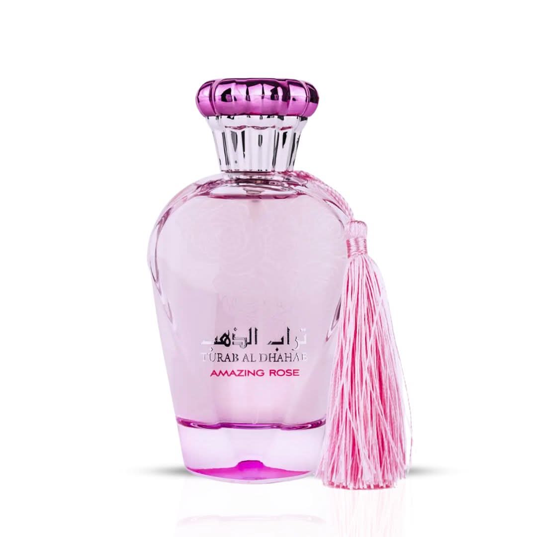 Ard Al Zaafaran Turab Al Dhahab Rose Eau de Parfum spray 100ml with velvet pouch, featuring a floral fragrance bottle.