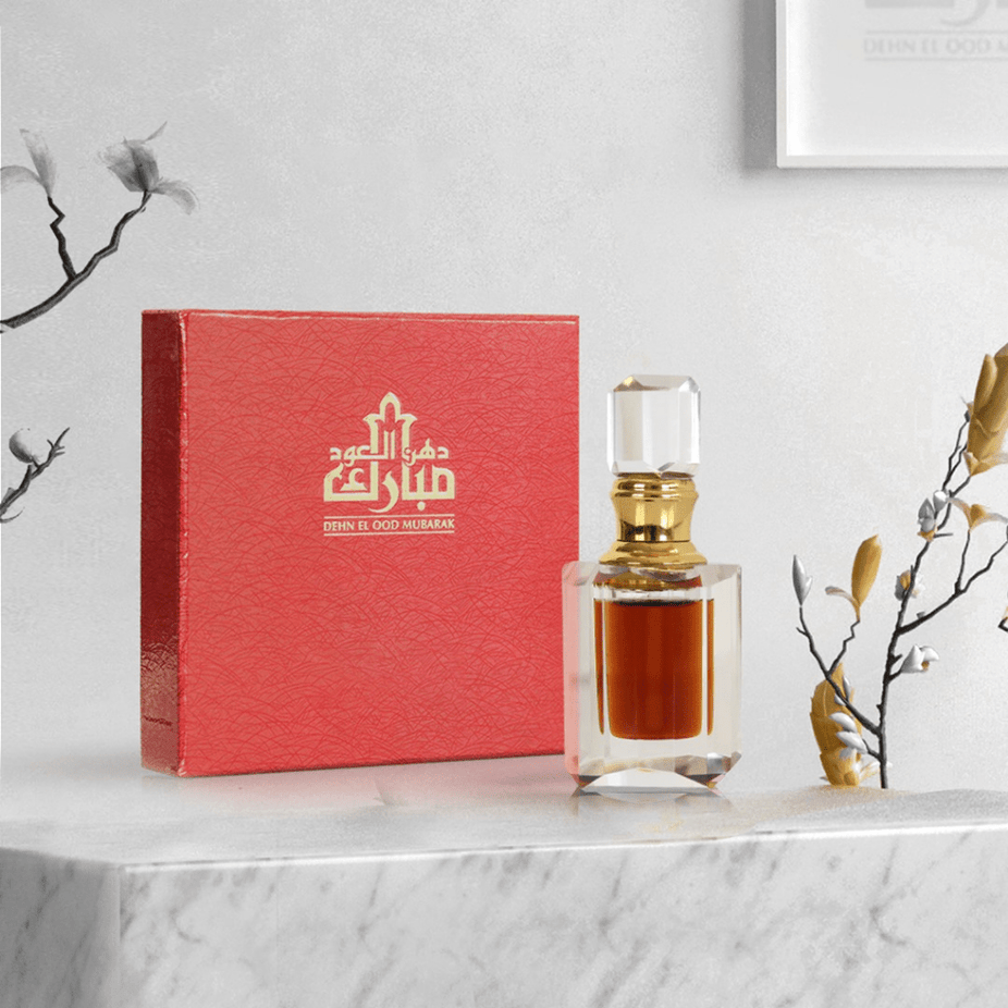 Swiss Arabian Dehn El Ood Mubarak perfume oil in a 6ml bottle, showcasing the elegant packaging and dark aromatic liquid.