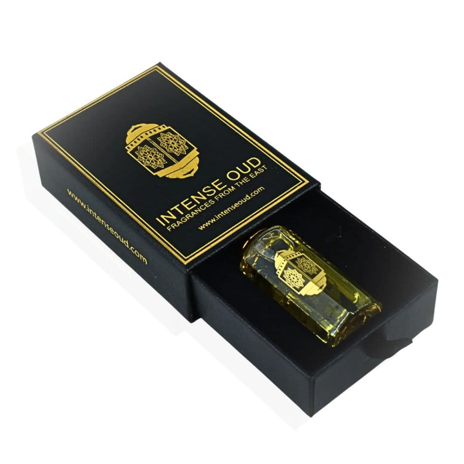 Intense Oud Bloom Perfume Oil 12ml with black gift box, featuring a clear glass bottle and elegant packaging.