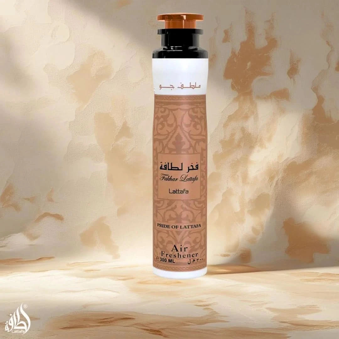 Lattafa Fakhar air freshener 300ml bottle with a sleek design, featuring a spray nozzle and clear branding label.