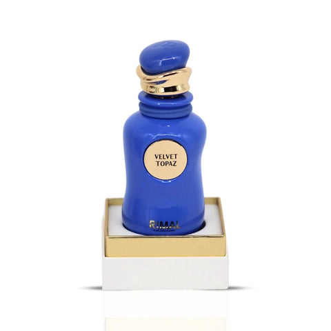 Velvet Topaz Eau de Parfum spray by Rimal Collection, 100ml bottle with elegant glass design and gold accents.