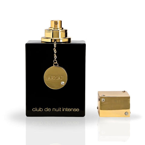 Armaf Club De Nuit Intense Women Eau de Parfum spray in a velvet pouch, 105ml, featuring a sleek bottle with elegant design.