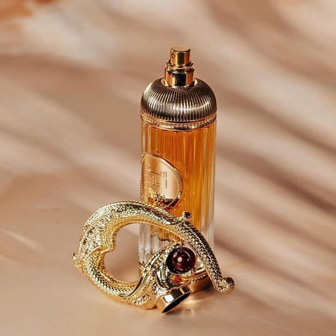 Lattafa Sehr Eau de Parfum Spray 100ml with velvet pouch, showcasing the elegant perfume bottle and packaging.