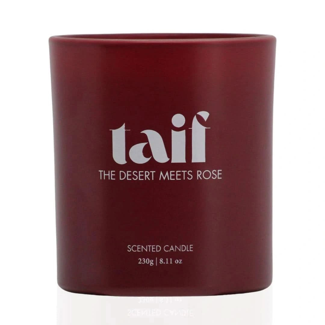 Intense Oud Taif Scented Candle with rose, oud, clove, vanilla, and amber notes in a luxury wax candle container.