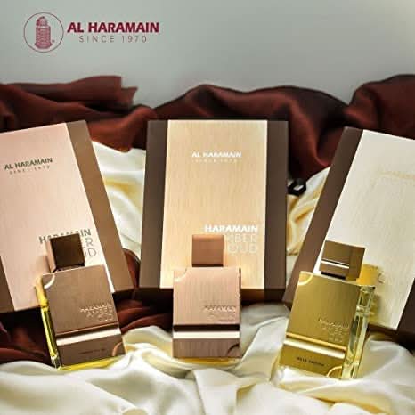 Al Haramain Amber Oud Gold & Tobacco Edition EDP bottles, 60ML, featuring luxurious perfume with warm amber, oud, and tobacco notes.