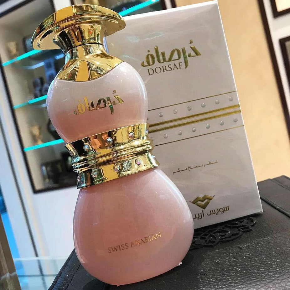 Dorsaf Eau De Parfum 75ml by Swiss Arabian, elegant perfume bottle with floral and woody notes, sleek design with cap.