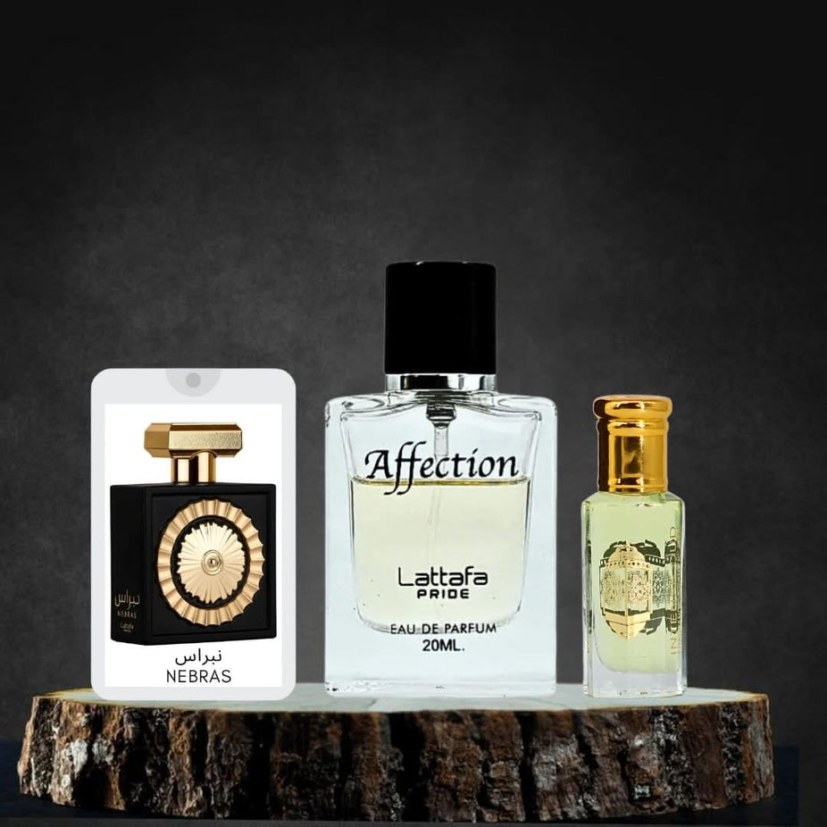 Intense Oud Nebras & Affection Eau de Parfum sprays and Lady Mile perfume oil in a magnetic gift box, featuring elegant packaging.