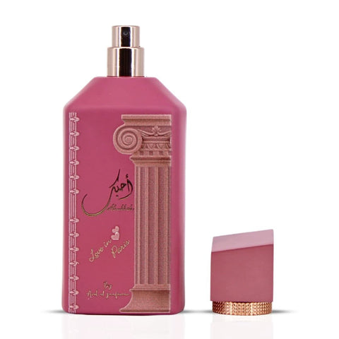 Ahubbak Love In Paris Eau de Parfum spray by Ard Al Zaafaran, 100ml bottle with velvet pouch, elegant fragrance presentation.