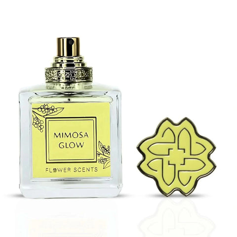 Flower Scents Mimosa Glow Eau de Parfum spray 65ml bottle with floral and citrus accents on a neutral background.