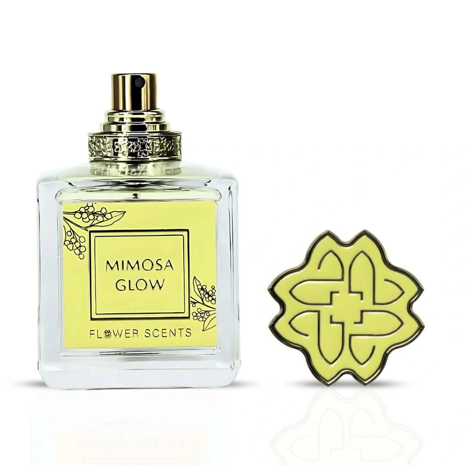 Flower Scents Mimosa Glow Eau de Parfum spray 65ml bottle with floral and citrus accents on a neutral background.