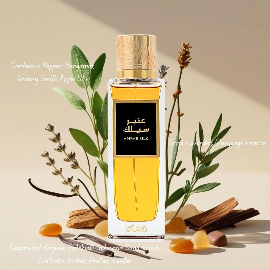 Rasasi Ambar Silk Eau de Parfum spray in a 200ml bottle, displayed with a velvet pouch, showcasing the elegant fragrance packaging.