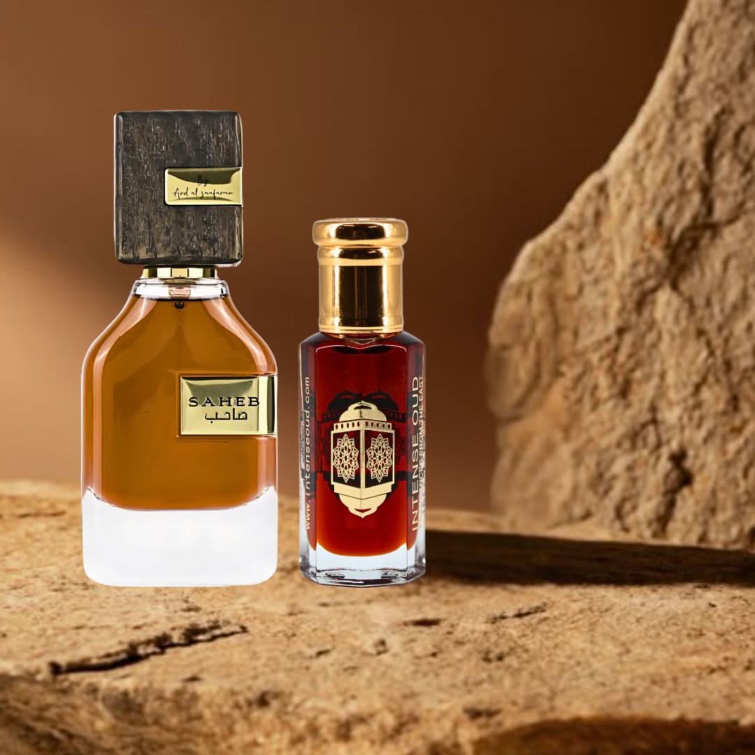 Bundle of Intense Oud Saheb Eau de Parfum spray and Mukhallat Al Zafran perfume oil, featuring elegant bottles and luxurious packaging.