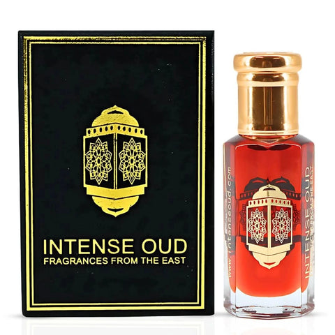 Rasasi Ambar Silk Eau de Parfum 200ML and Gold Saffron Perfume Oil 12ML duo, featuring warm spice and elegant fragrance bottles.
