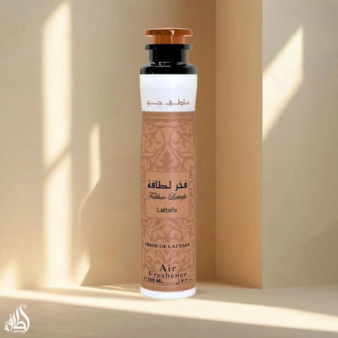Fakhar Air Freshener 300ml bottle by Lattafa with a sleek design and vibrant label, showcasing the fresh scent inside.