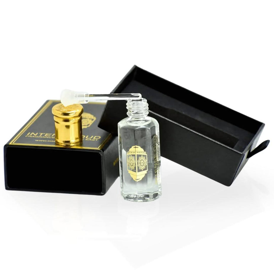 Intense Oud Al Bahar Perfume Oil 12ml in black gift box, featuring elegant loose oil bottle with intricate design.