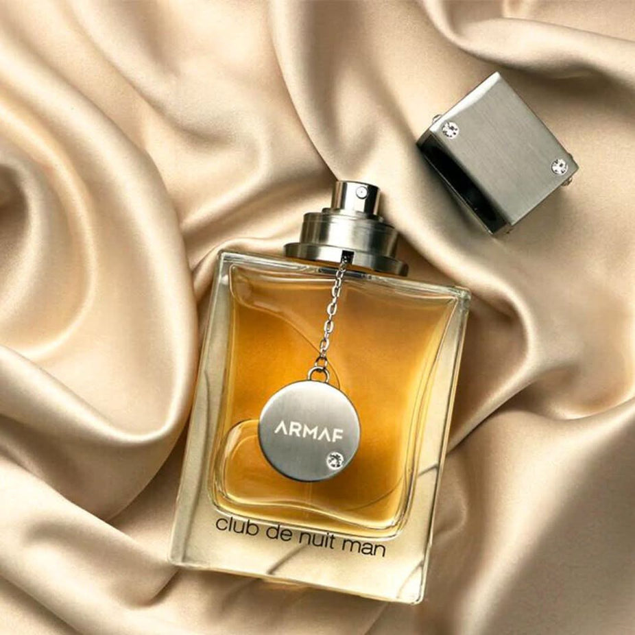 Armaf Club De Nuit Man EDT 105ml bottle, showcasing sleek design and label, representing a long-lasting, seductive men's fragrance.