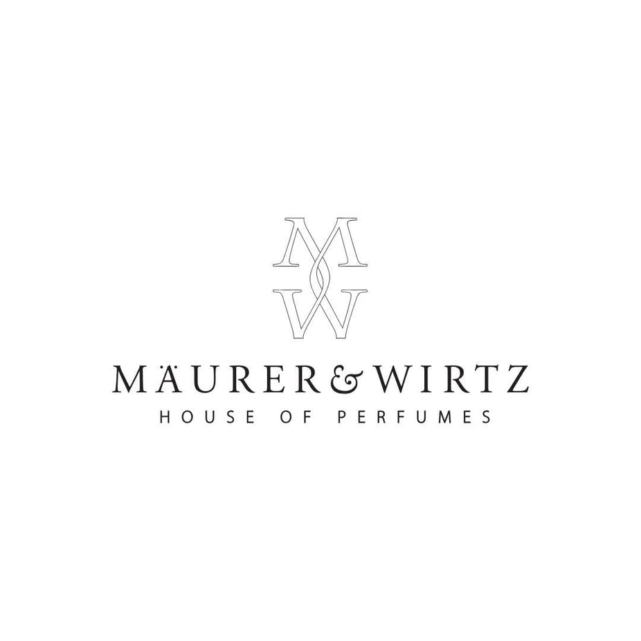 Miniature 4ml Maurer & Wirtz Tabac Original Eau De Toilette EDT fragrance bottle with sleek design and luxurious packaging.