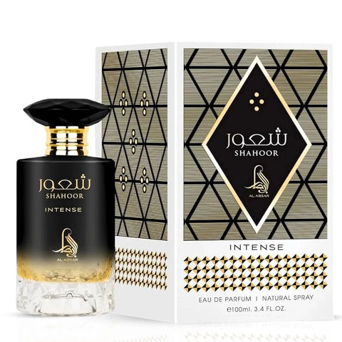 Bundle of Lattafa Eclaire Banoffi and Shahoor Intense Al Absar Eau de Parfum sprays, 100ml bottles, featuring elegant perfume bottles.
