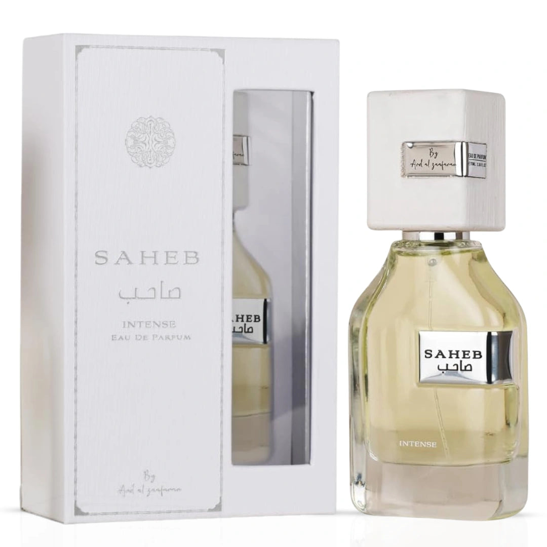 Bundle of Ard Al Zaafaran Saheb, Saheb Intense & Sahebat Al Jamal Eau de Parfum spray bottles, 70ml each, with elegant packaging.