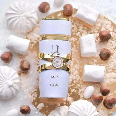 Lattafa Yara Eau de Parfum spray bundle including Yara Candy, Yara Moi, and Yara Tous, 100ml each, in colorful packaging.