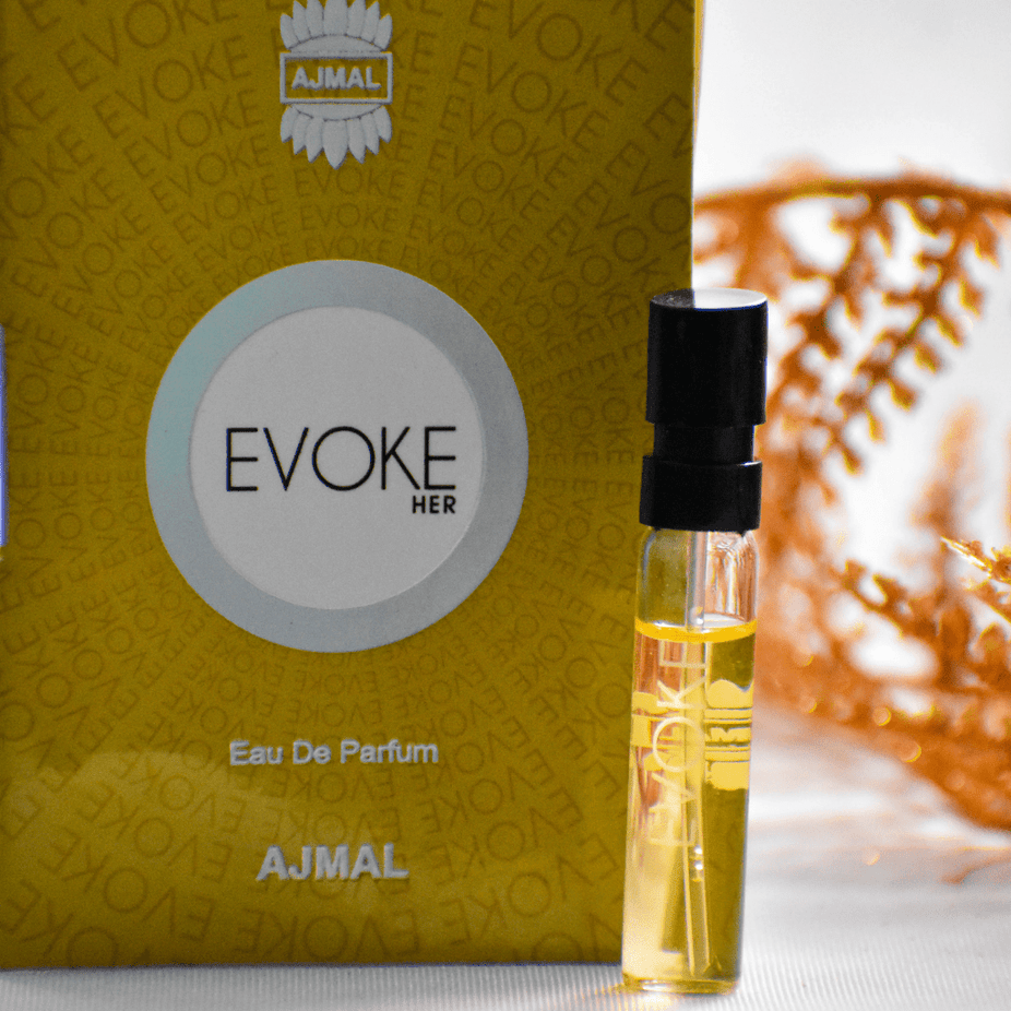 Evoke EDP sample for women by Ajmal, 1ML perfume vial, transparent glass bottle with floral design, showcasing the fragrance sample.