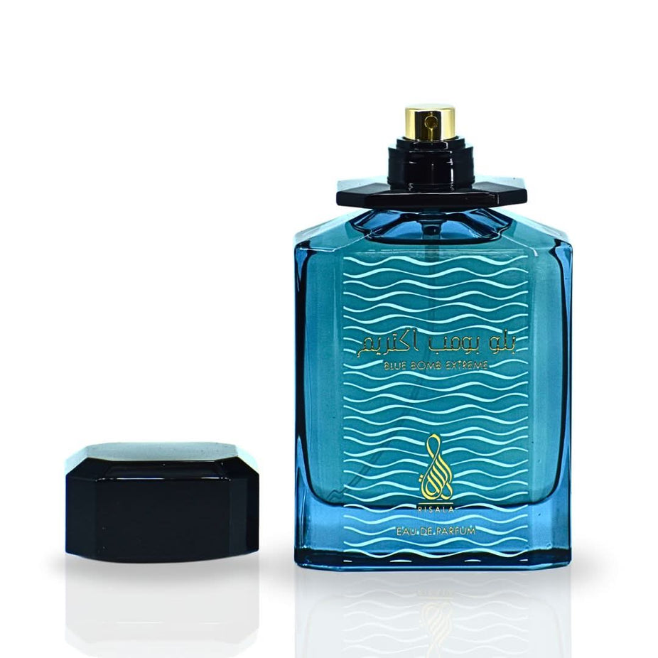 Blue Bomb Extreme EDP Spray by RISALA, 100ML, featuring a sleek bottle and luxurious, captivating fragrance.