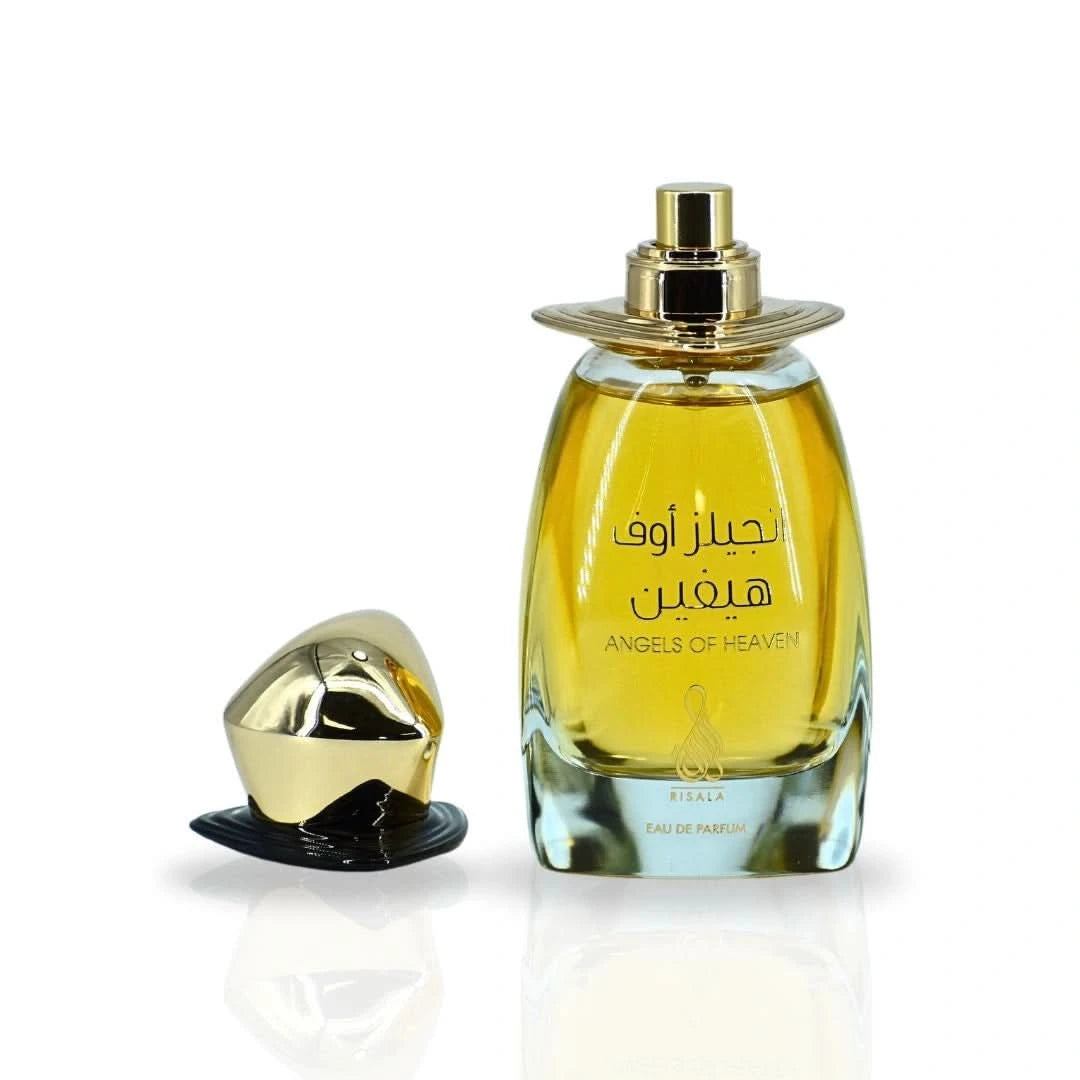 RISALA Angels Of Heaven Eau de Parfum spray 100ml with elegant velvet pouch, featuring a sleek glass bottle and floral fragrance.