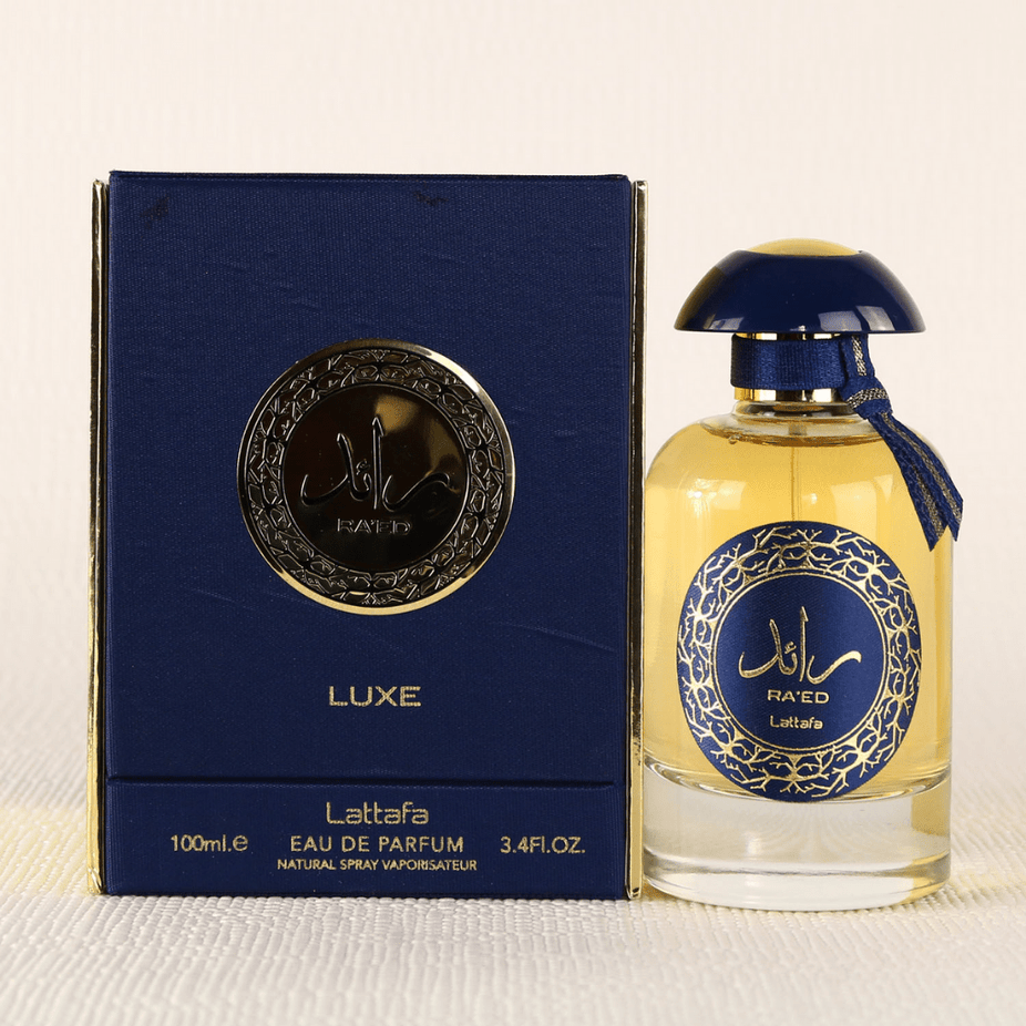 Lattafa Ra'ed Gold Luxe Eau De Parfum 100ML bottle with gold accents, elegant design, and clear fragrance label visible.