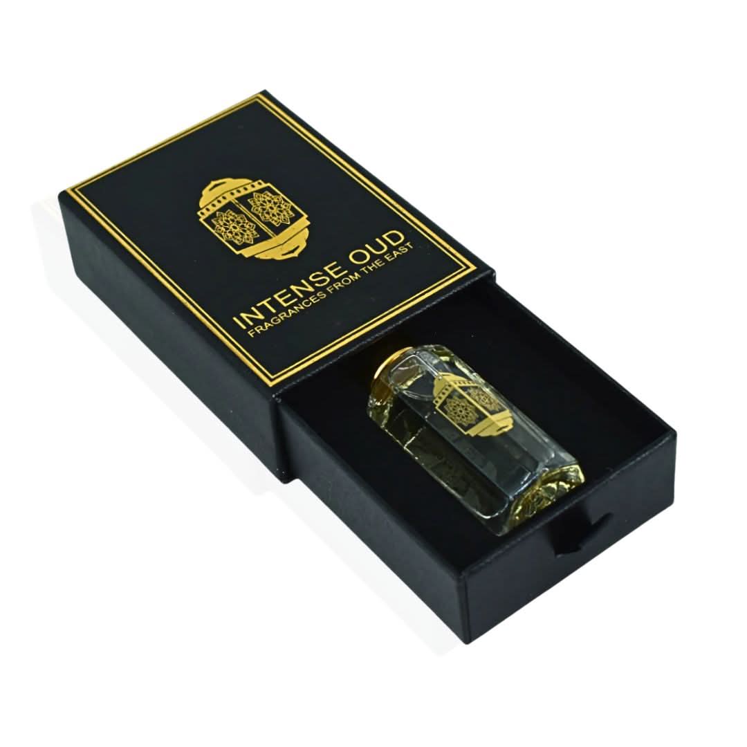 Intense Oud Majnoon Perfume Oil 12ml in a black gift box, featuring a luxurious loose oil with floral and woody fragrance elements.