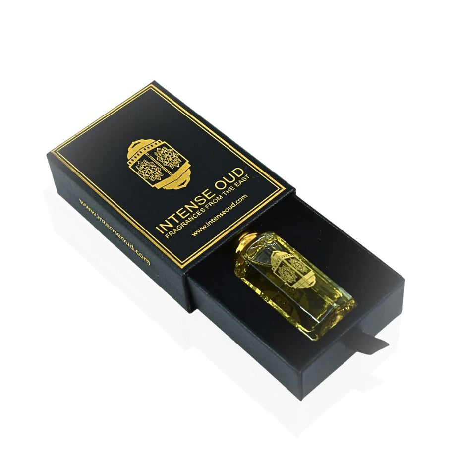 Intense Oud Touch Of Amber perfume oil in 12ml bottle with black gift box, showcasing the luxurious loose oil container.