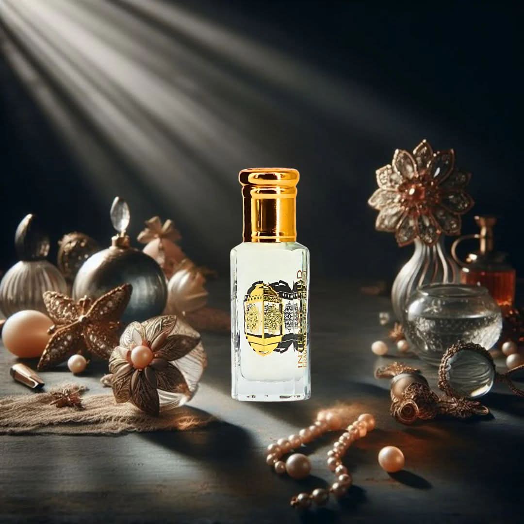 Intense Oud Rouje & Blush Perfume Oils bundle with 12ml bottles in black gift box, featuring floral and oriental fragrance highlights.