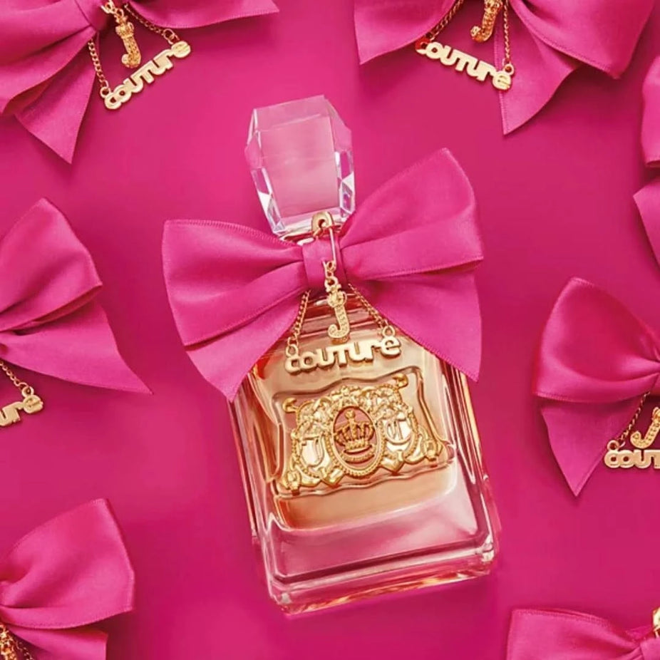 Viva La Juicy gift set with 1.7 oz and 0.33 oz Eau de Parfum bottles and 4.2 oz body souffle by Juicy Couture