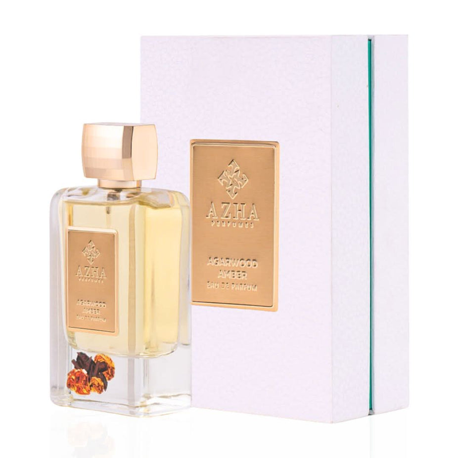Agarwood Amber Eau de Parfum spray by AZHA, showcasing the elegant 100ml bottle with amber-colored liquid.