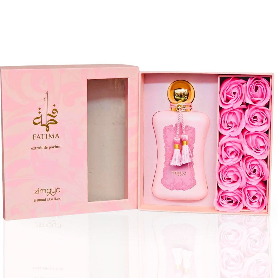 Zimaya Fatima Pink Eau De Parfum spray bottle, 100ml, with elegant pink packaging and cap, showcasing the fragrance's luxurious design.