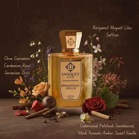 Aphrodisiac Touch Extrait de Parfum 100ml by Unique'e Luxury, elegant glass bottle of EDP perfume with a sleek design.
