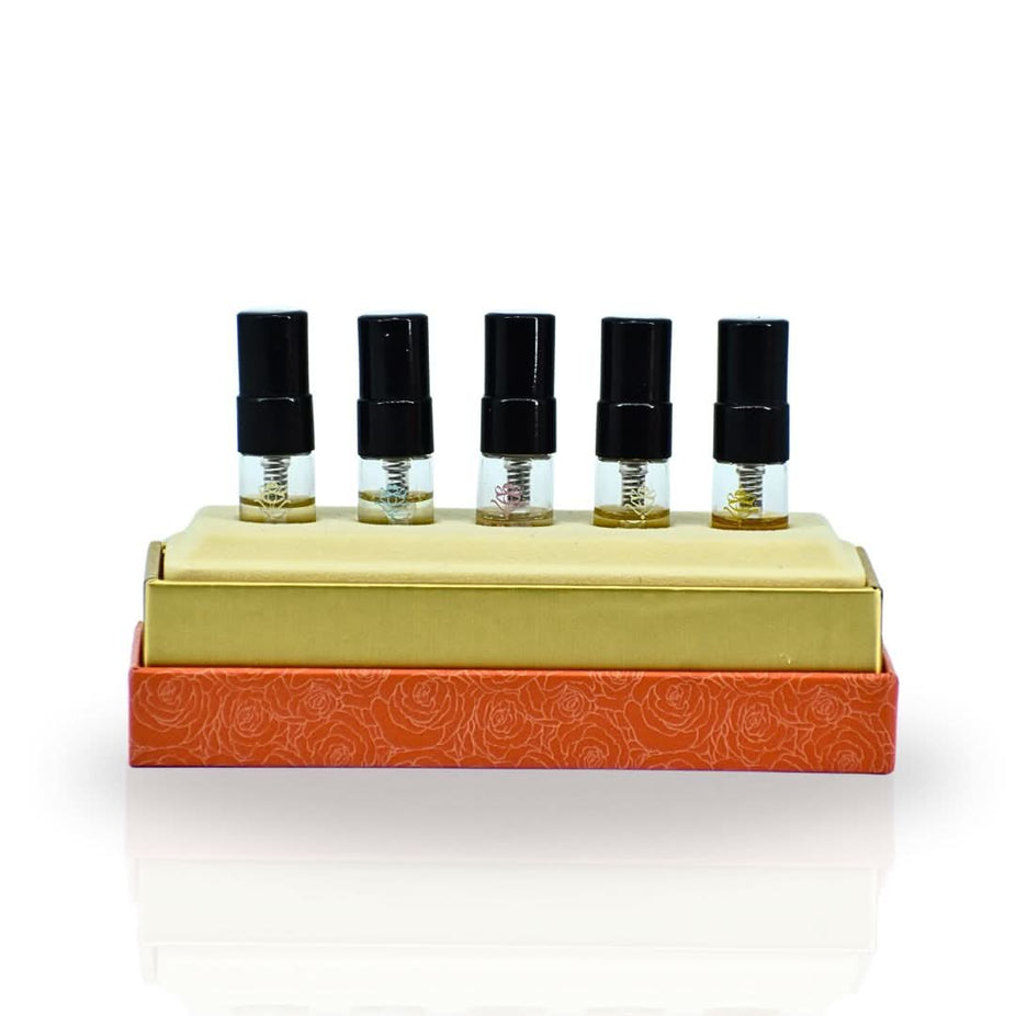 Set of four Reef Perfumes 3ml EDP sprays including Reef 19, Reef 33, Summer Tiffany, Pink, and Yellow fragrances.