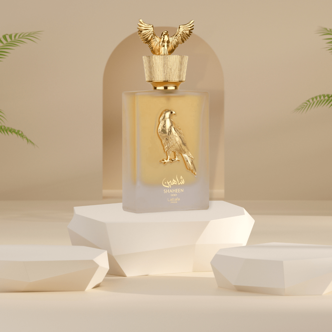 Lattafa Pride Shaheen Gold Eau de Parfum spray 100ml with velvet pouch, showcasing the elegant bottle design.
