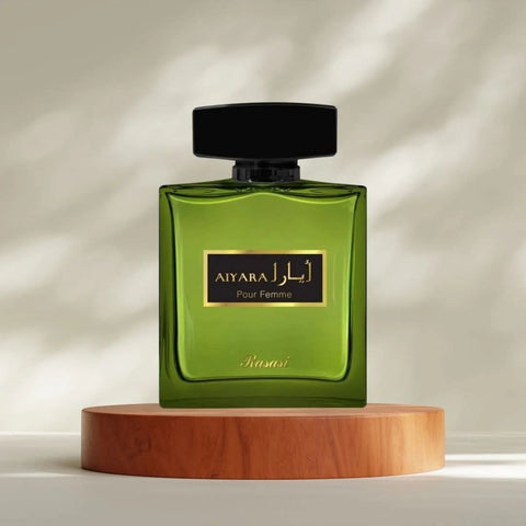 Rasasi Aiyara Pour Homme and Femme Eau de Parfum spray bundle, 100ml each, featuring elegant bottles with floral and masculine design elements.