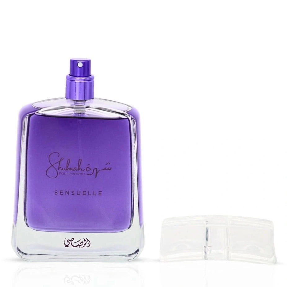 Rasasi Shuhrah Sensuelle Pour Femme Eau de Parfum spray 90ml with elegant perfume bottle and floral accents.