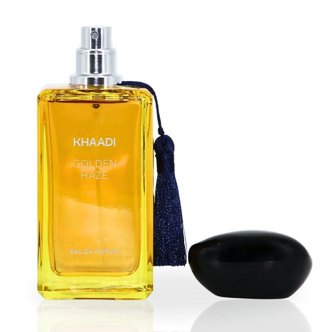 Golden Haze Eau de Parfum Spray by Khaadi, 100ml bottle, elegant fragrance with gold accents, sleek perfume bottle on a neutral background.