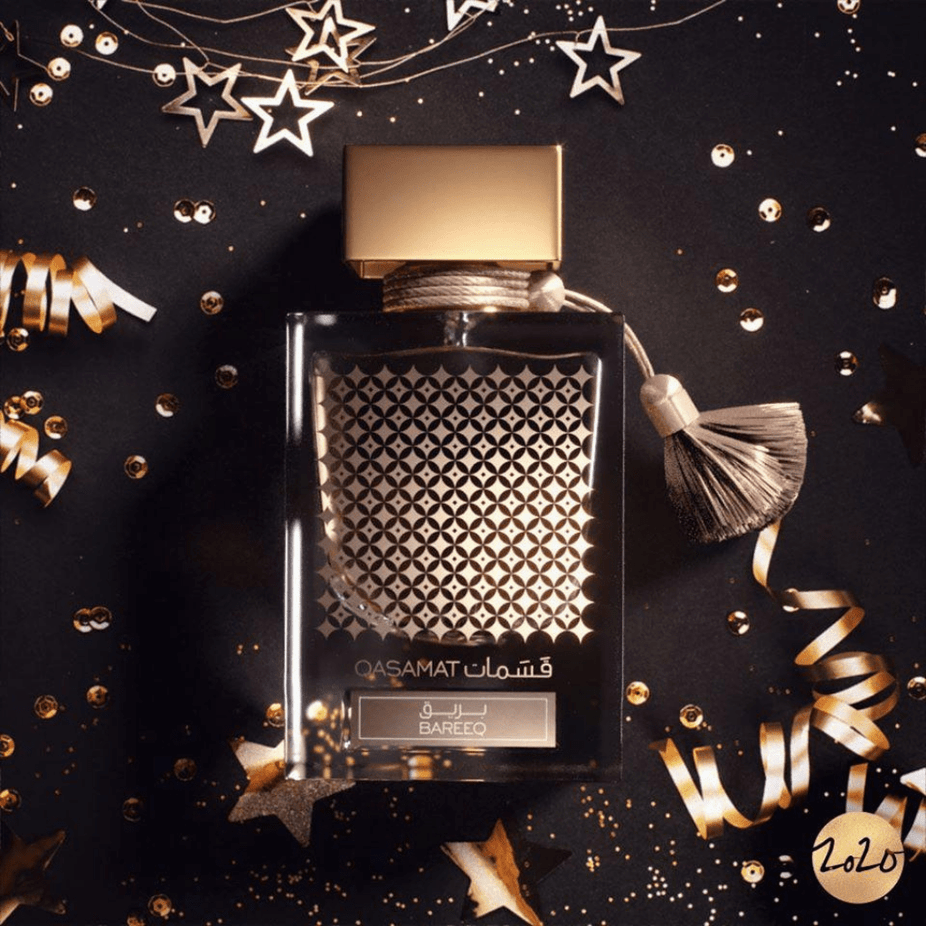 Rasasi Qasamat Bareeq EDP Eau De Parfum 65ML bottle with elegant packaging and floral fragrance details.