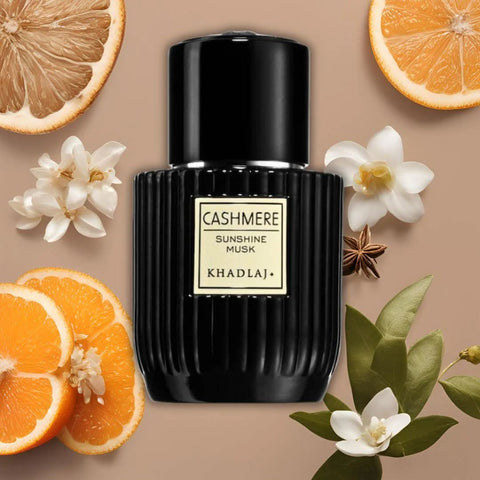 Bundle of Khadlaj Cashmere Sunshine Musk and Warm Oud Eau de Parfum sprays, 100ml each, showcasing elegant perfume bottles.