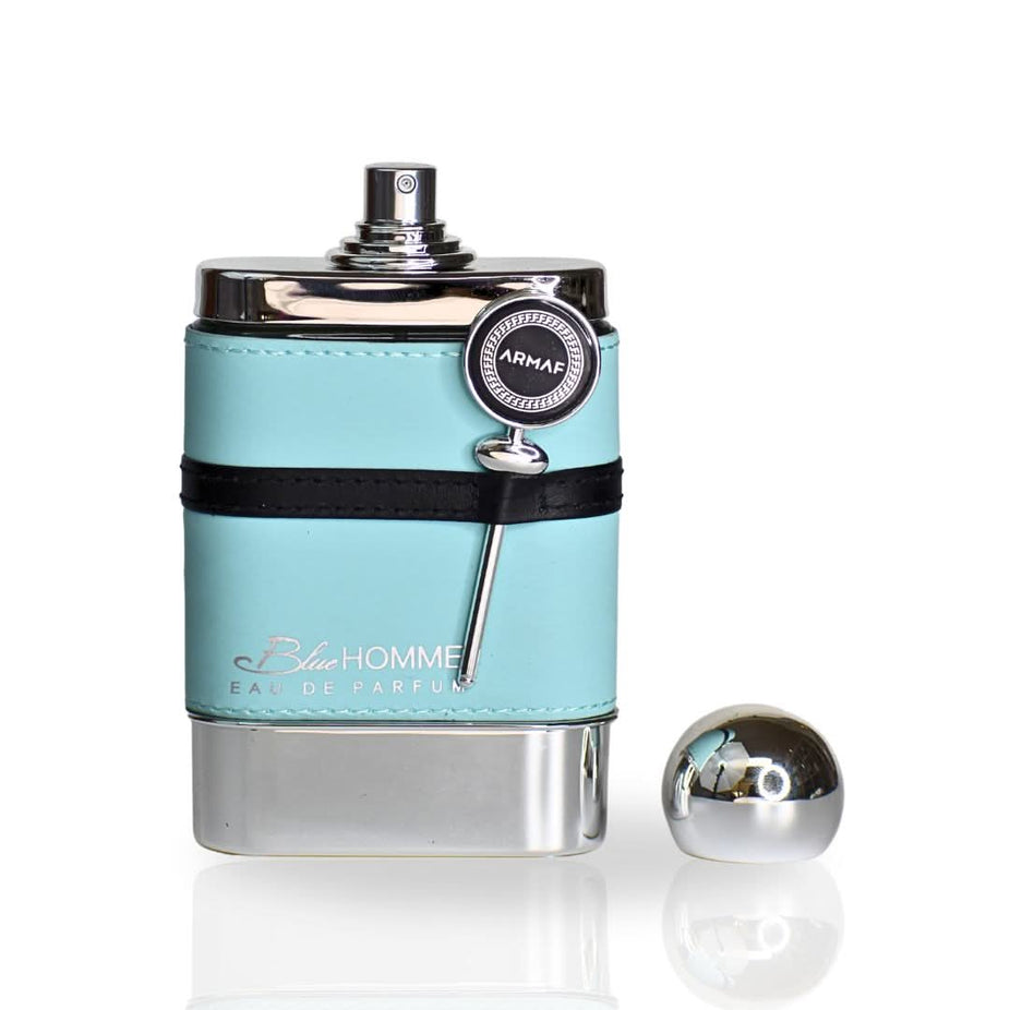 Blue Homme EDP Spray by Armaf, a 100ML luxurious Eau De Parfum bottle with a sleek blue design, long-lasting signature Arabian scent.