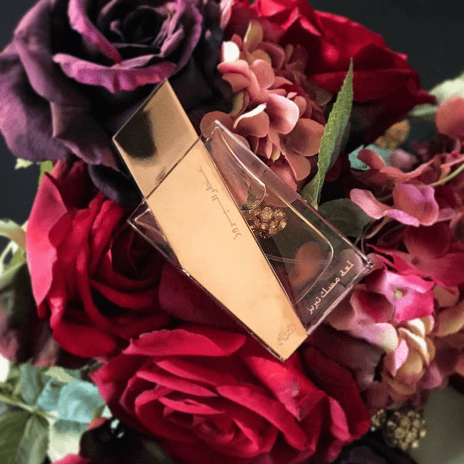 Rasasi Boruzz Lamaat Musk Tabriz EDP 50ml perfume bottle with elegant packaging and floral musk fragrance design.