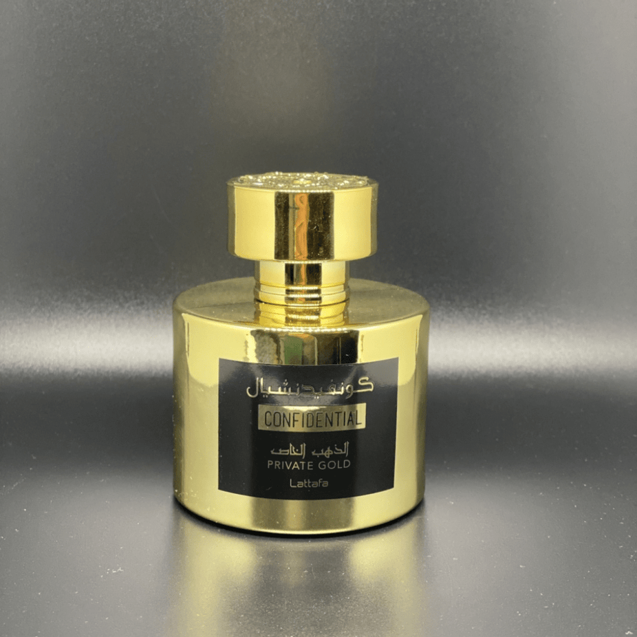 Lattafa Confidential Private Gold Eau de Parfum spray bottle with elegant gold accents, 100ml, showcasing luxurious fragrance packaging.